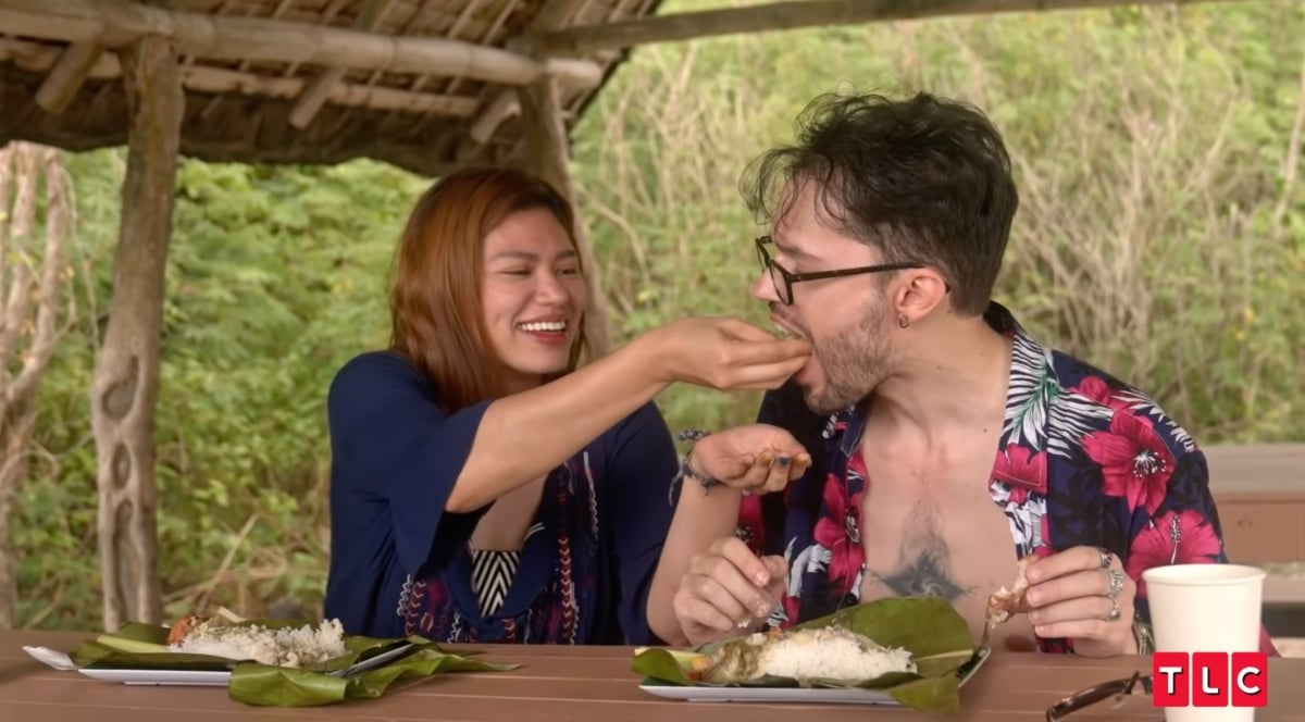 Arielle feeds Sidian Jones food during his trip to the Philippines on 'Seeking Sister Wife' Season 4 on TLC.