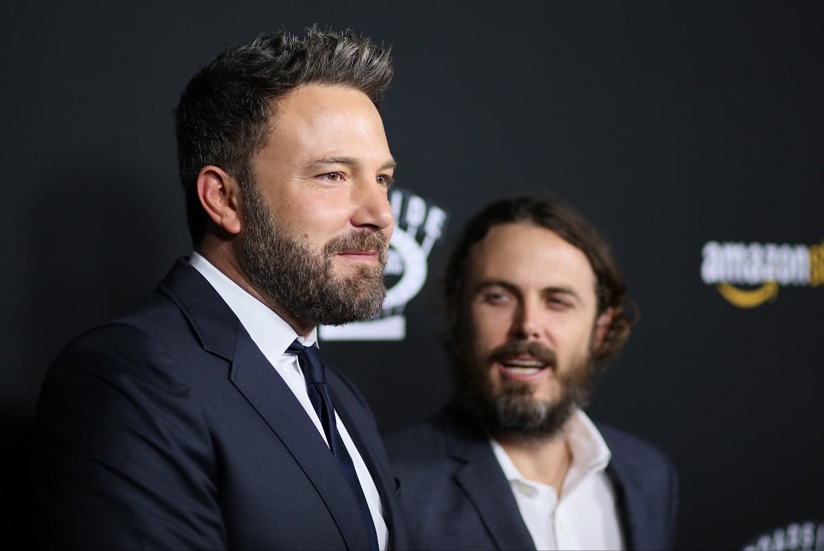 Ben Affleck and Casey Affleck posing at the premiere of 'Manchester by the Sea.'