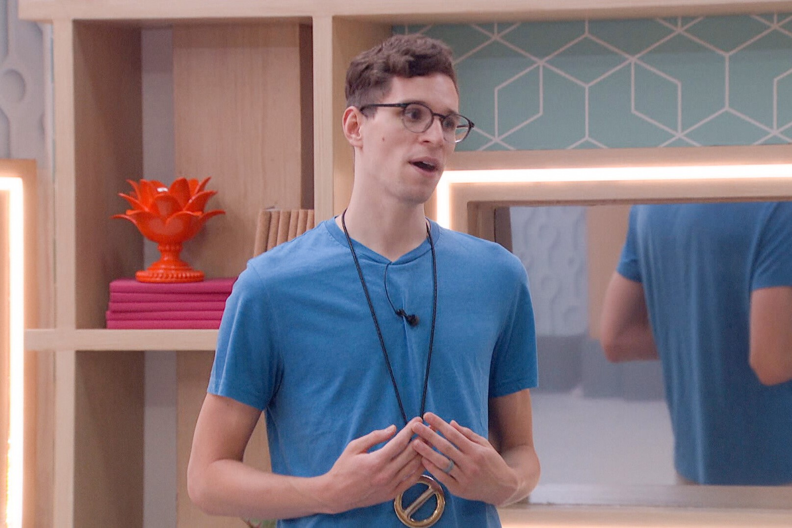 Michael Bruner, who stars in 'Big Brother 24' on CBS, wears a blue shirt and the Power of Veto necklace.