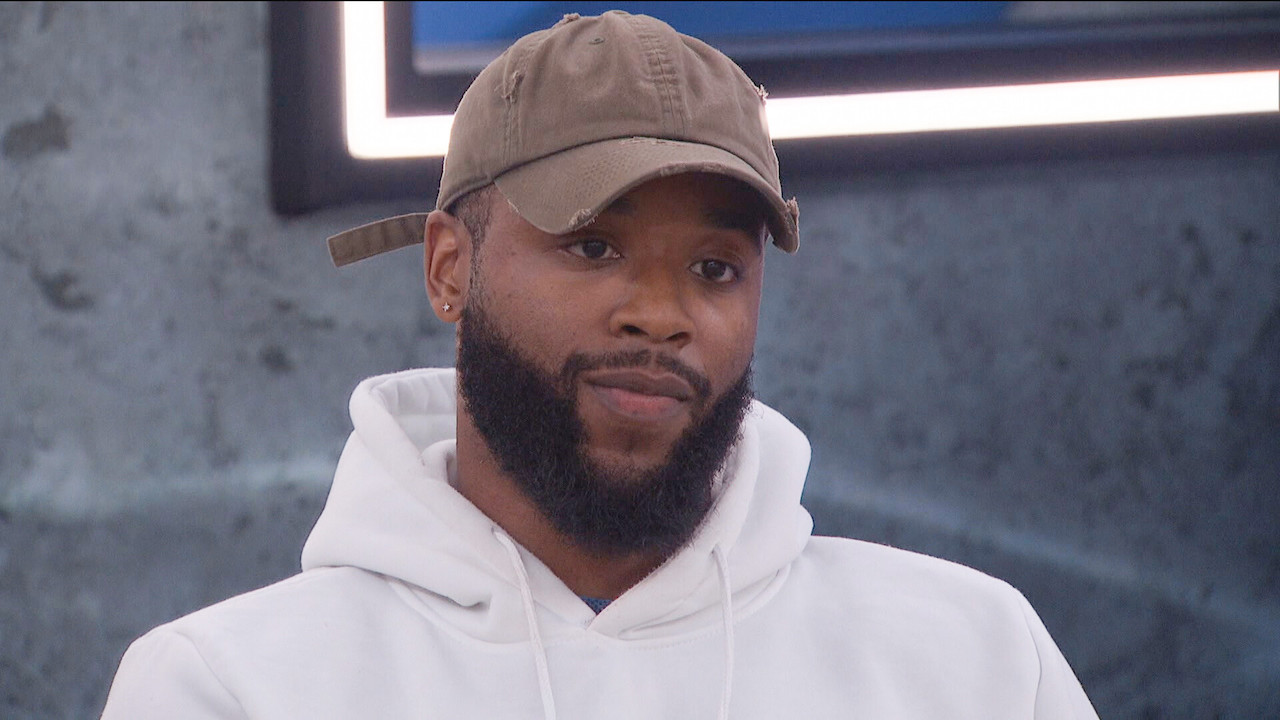 Monte Taylor wears a hat sitting down on 'Big Brother 24'.