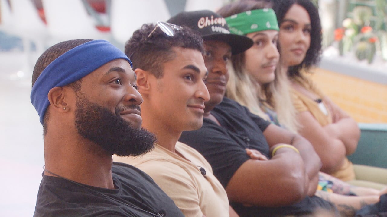 Monte Taylor, Joseph Abdin, Terrence Higgins, Matt "Turner," and Jasmine Davis sit next to each other in the living room on 'Big Brother'.