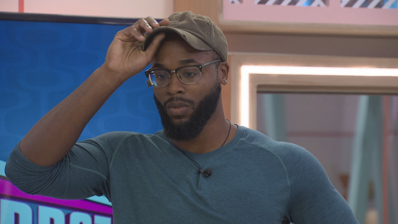 Monte Taylor looks worried as he lifts his hat on 'Big Brother 24'.