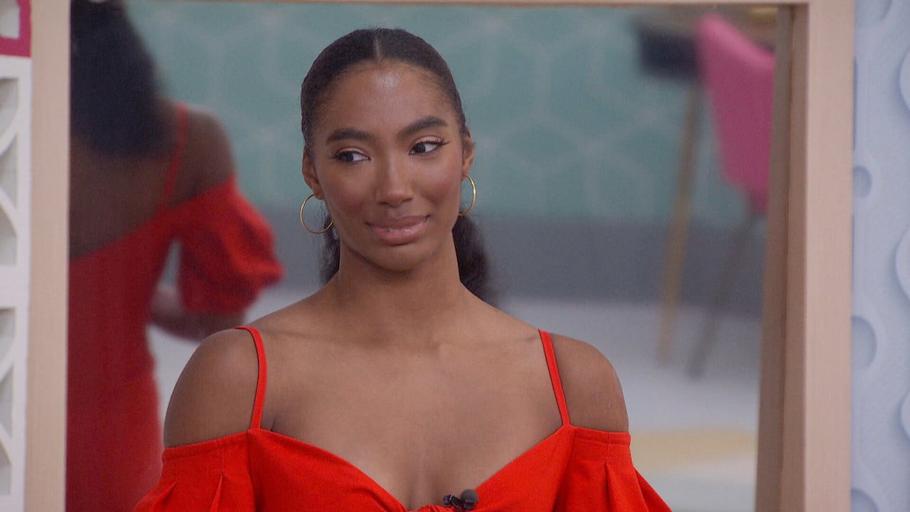 Taylor Hale stands in a red dress on 'Big Brother 24'.