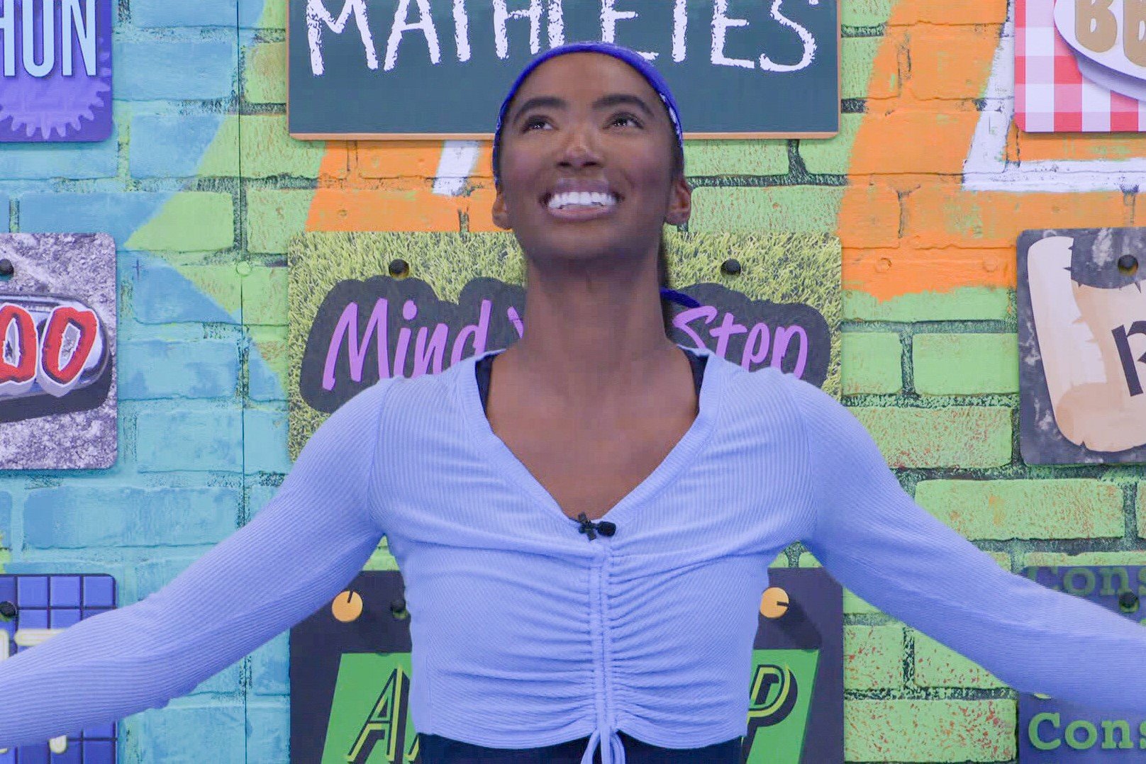 Taylor Hale, who won 'Big Brother 24' on CBS, wears a light blue long-sleeved cropped shirt.