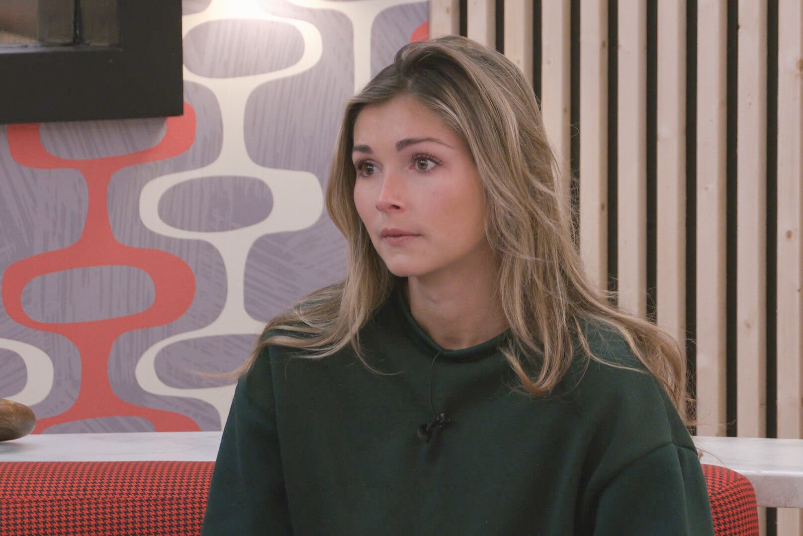Alyssa Snider, who, according to 'Big Brother 24' spoilers, was nominated for eviction during week nine, wears a dark green sweater.