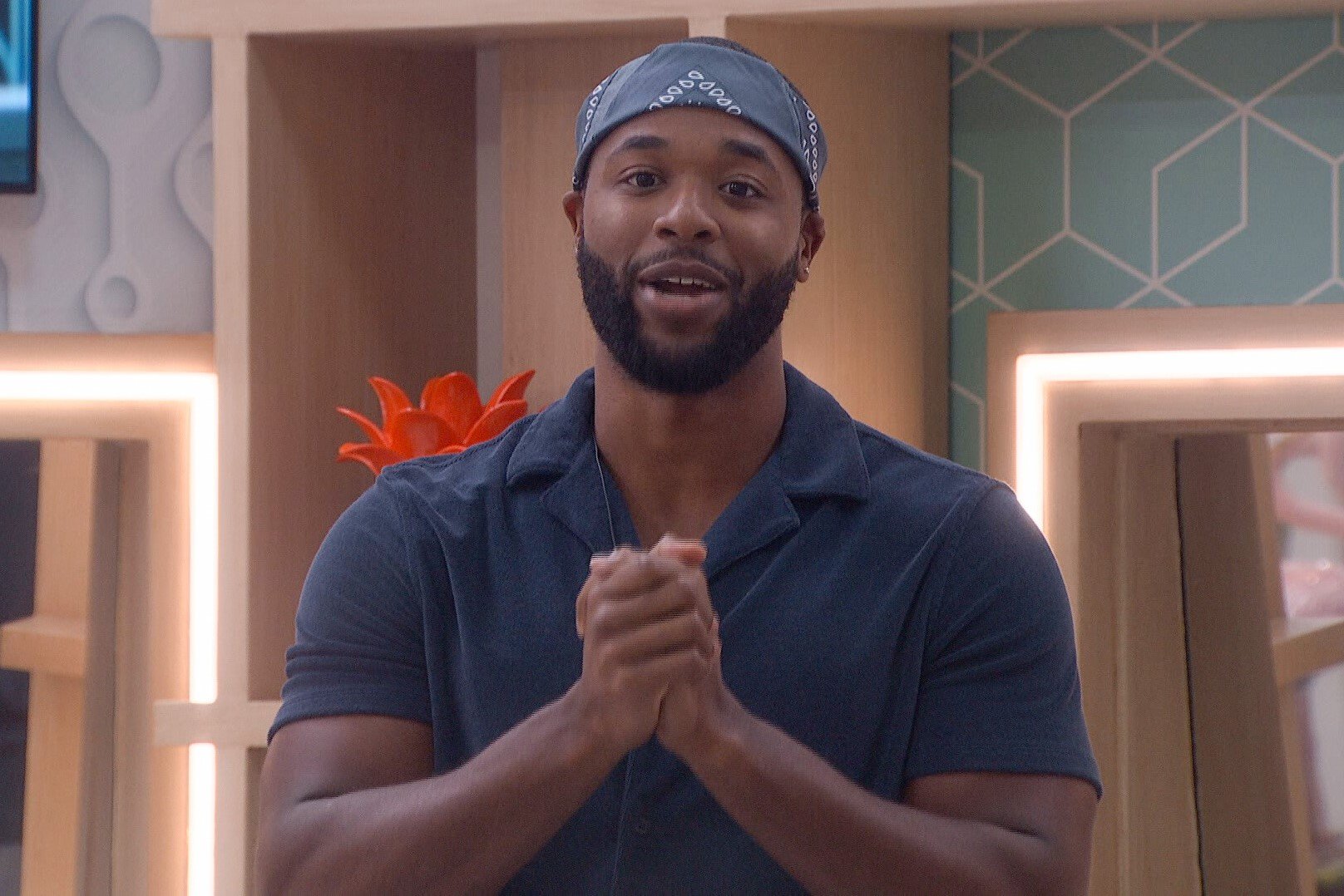 Monte Taylor, who, according to 'Big Brother 24' spoilers secured his spot in the final three, wears a dark blue polo shirt and blue bandana as a headband.