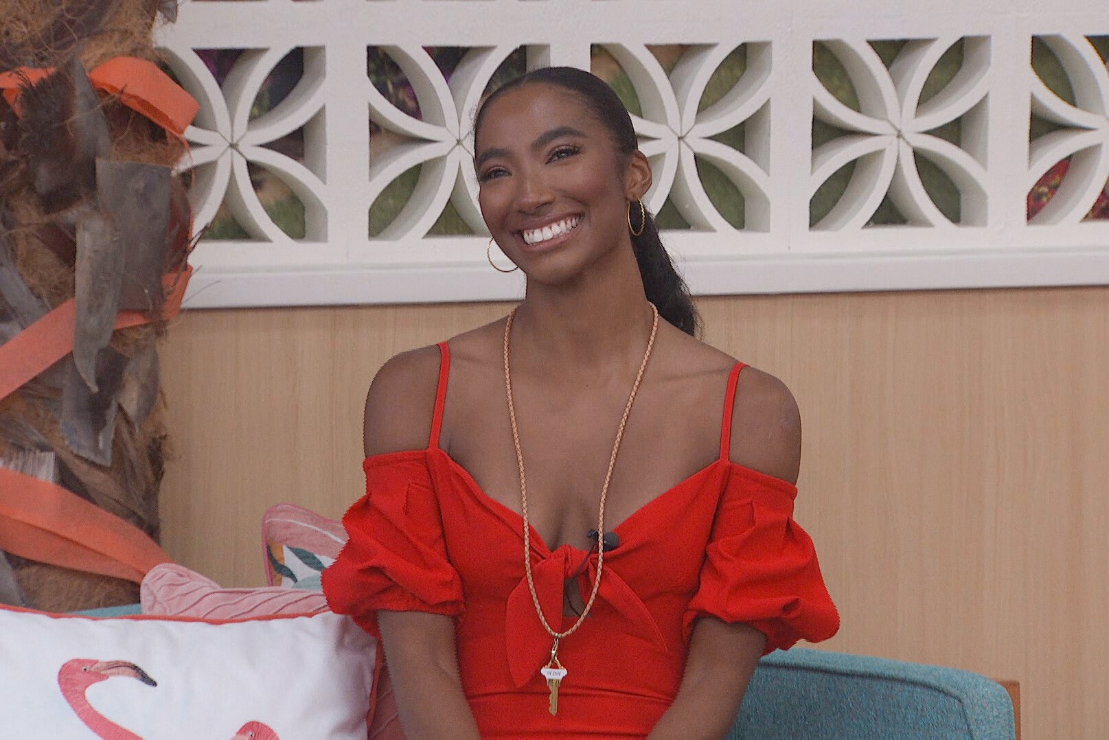 Taylor Hale, who could win 'Big Brother 24' on CBS, wears a red dress and the HOH key around her neck.