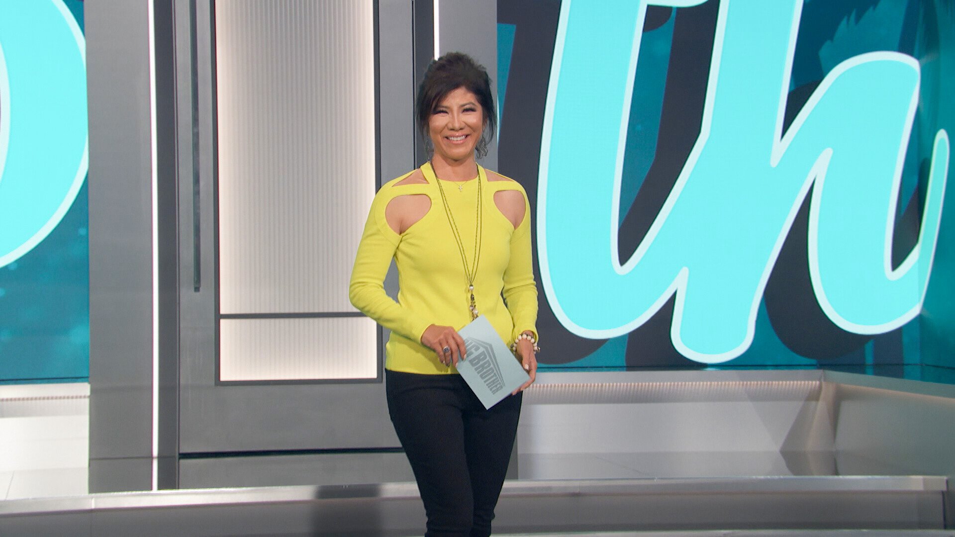 Host Julie Chen Moonves standing outside the Big Brother house