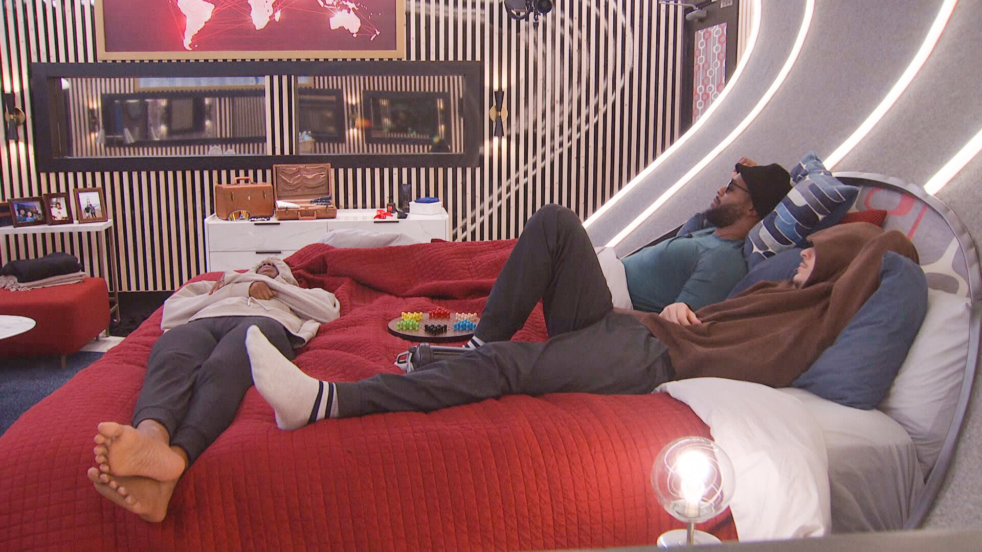 Taylor Hale, Monte Taylor, and Matt 'Turner' laying in the HOH bed during 'Big Brother 24'