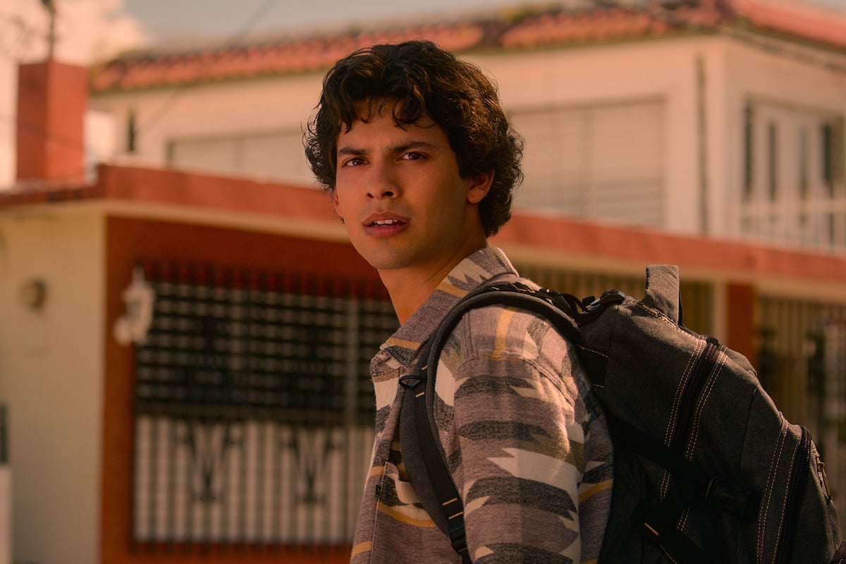 'Blue Beetle' star Xolo Maridueña wears a backpack as Miguel on 'Cobra Kai'