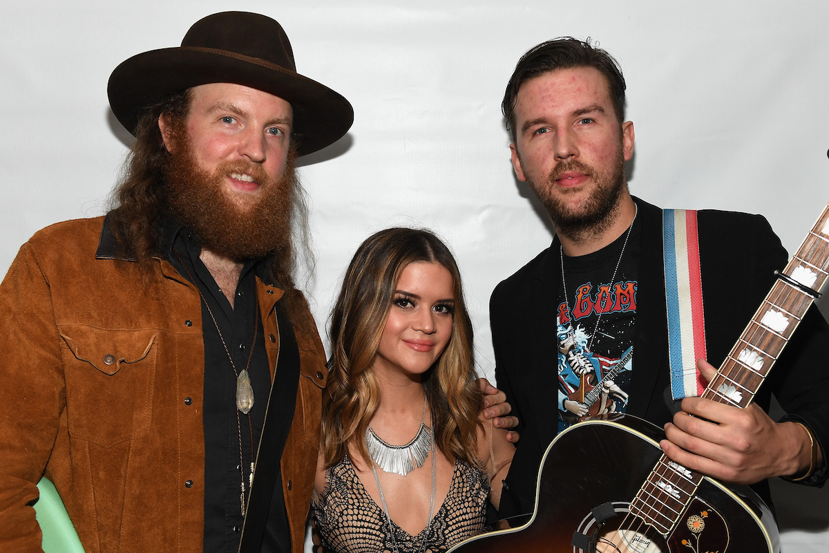 The Brothers Osborne and Maren Morris pose backstage at the 2016 AIMP Nashville Awards