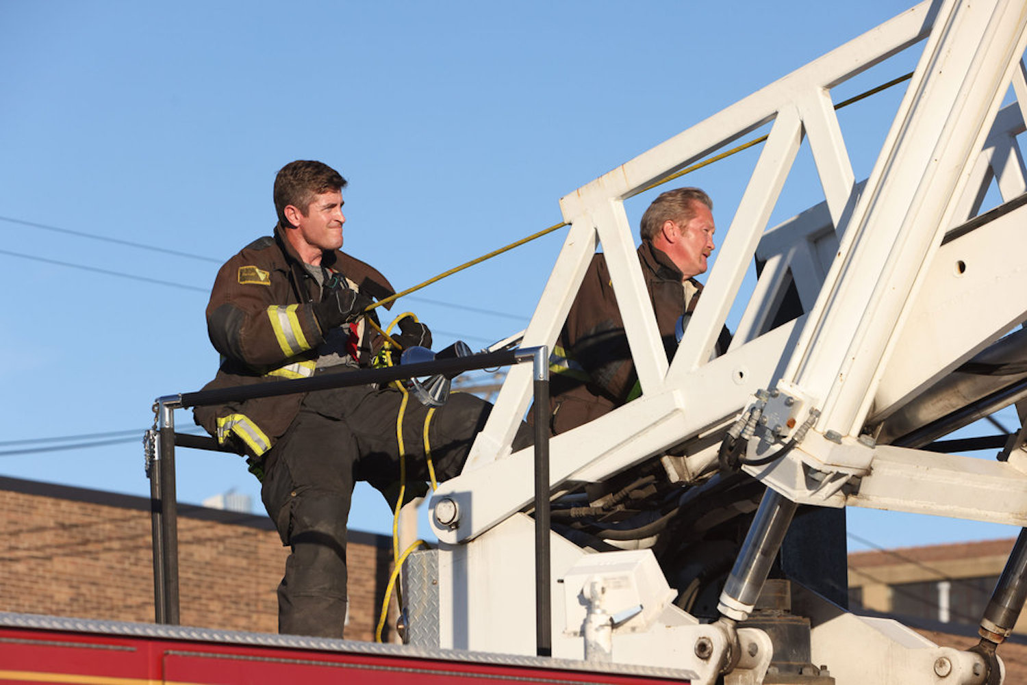 Sam Carver and Mouch attending to an emergency in 'Chicago Fire' Season 11 Episode 2