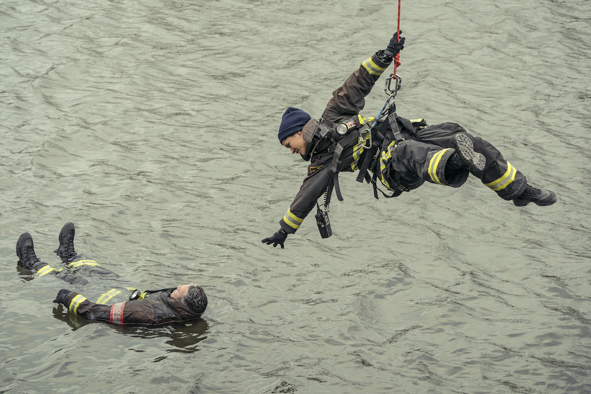 'Chicago Fire' cast members Taylor Kinney as Kelly Severide, (L), in the Chicago River and Miranda Rae Mayo as Stella Kidd (R), propelling in a rescue scene