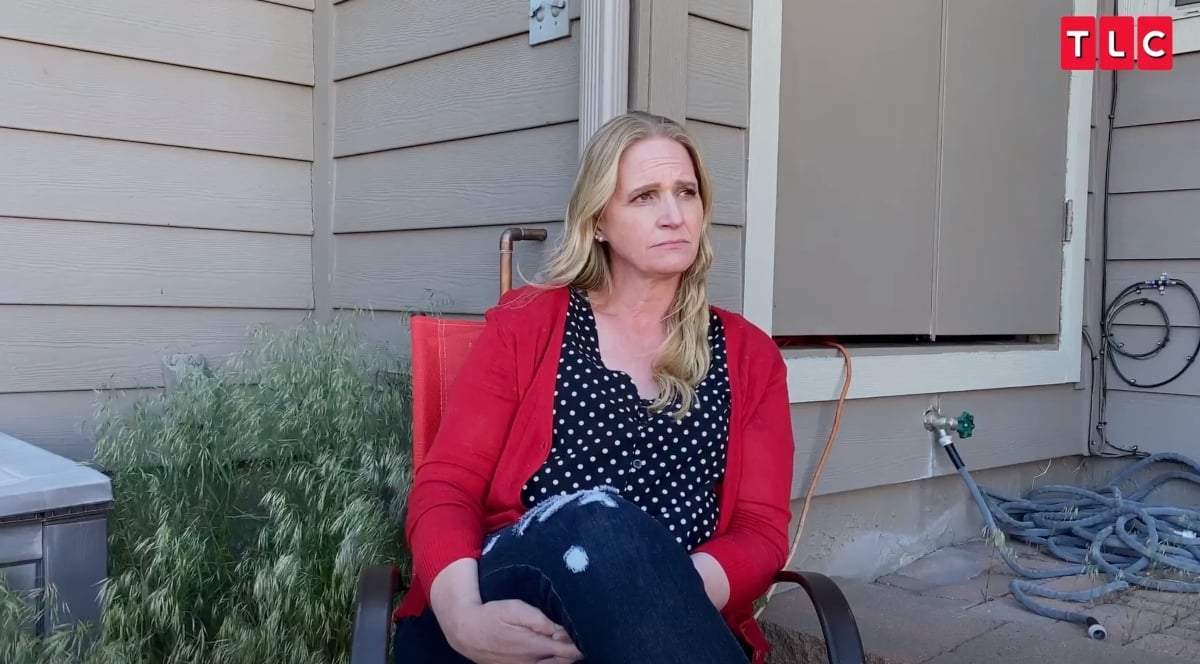 Christine Brown wearing a red jacket outside in Flagstaff, Arizona on Sister Wives' Season 17 on TLC.