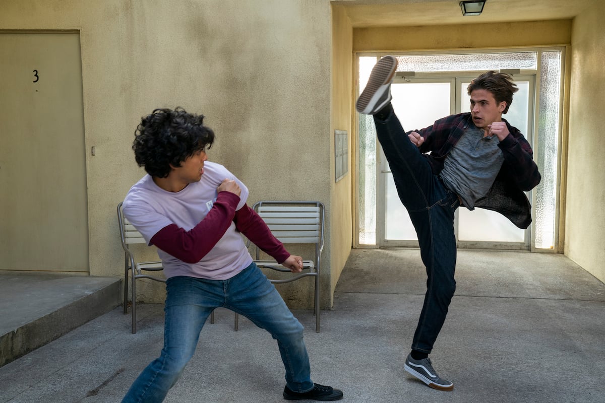 'Cobra Kai' Season 5: Miguel (Xolo Mariduena) and Robby (Tanner Buchanan) fight in the courtyard