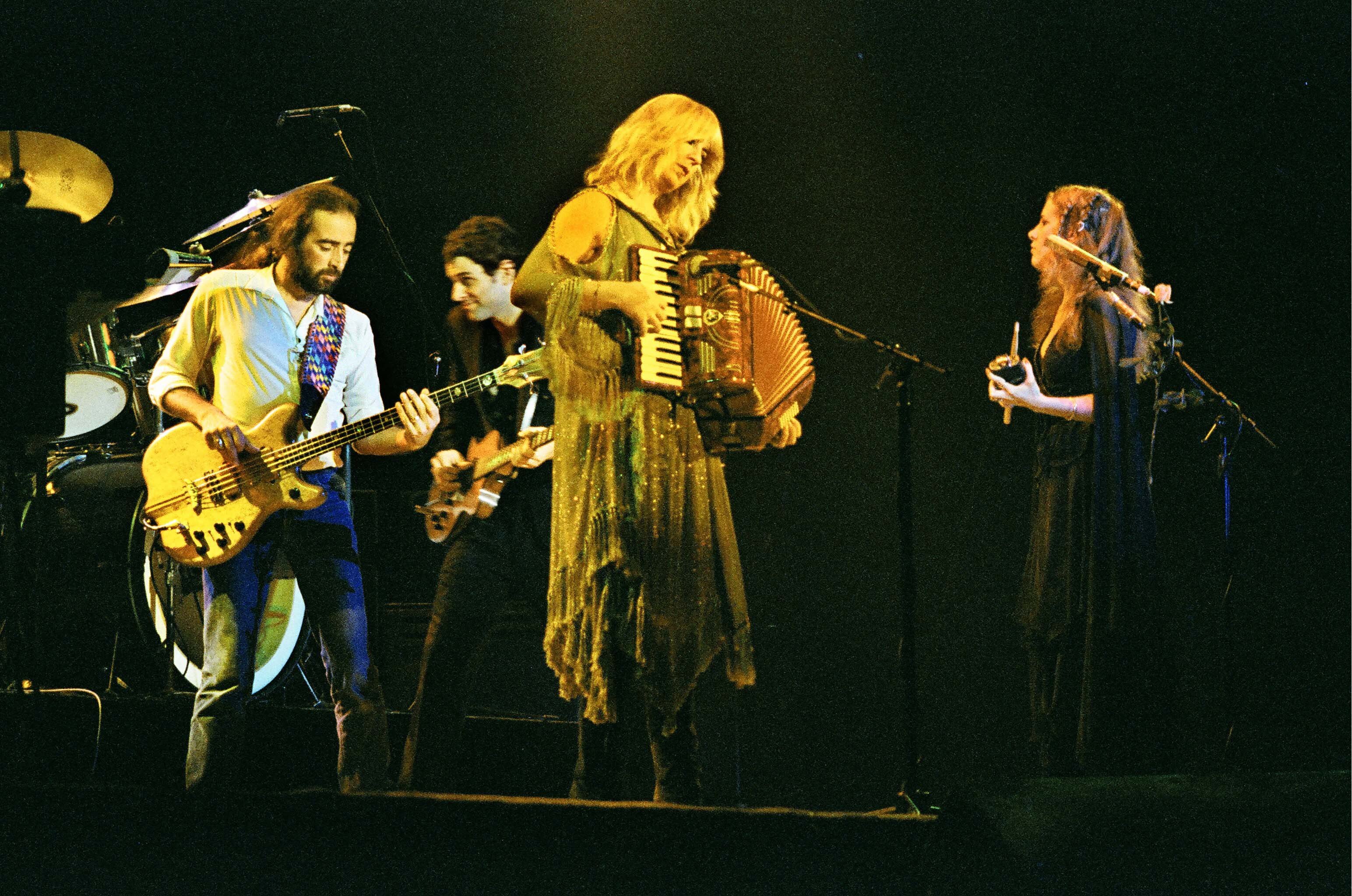 John McVie, Lindsey Buckingham, Christine McVie, Stevie Nicks performing live onstage as Fleetwood Mac