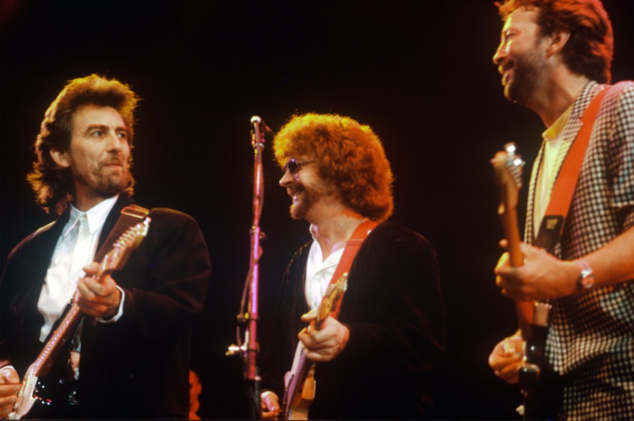 George Harrison, Jeff Lynne, and Eric Clapton performing during the Prince's Trust Concert in 1987.