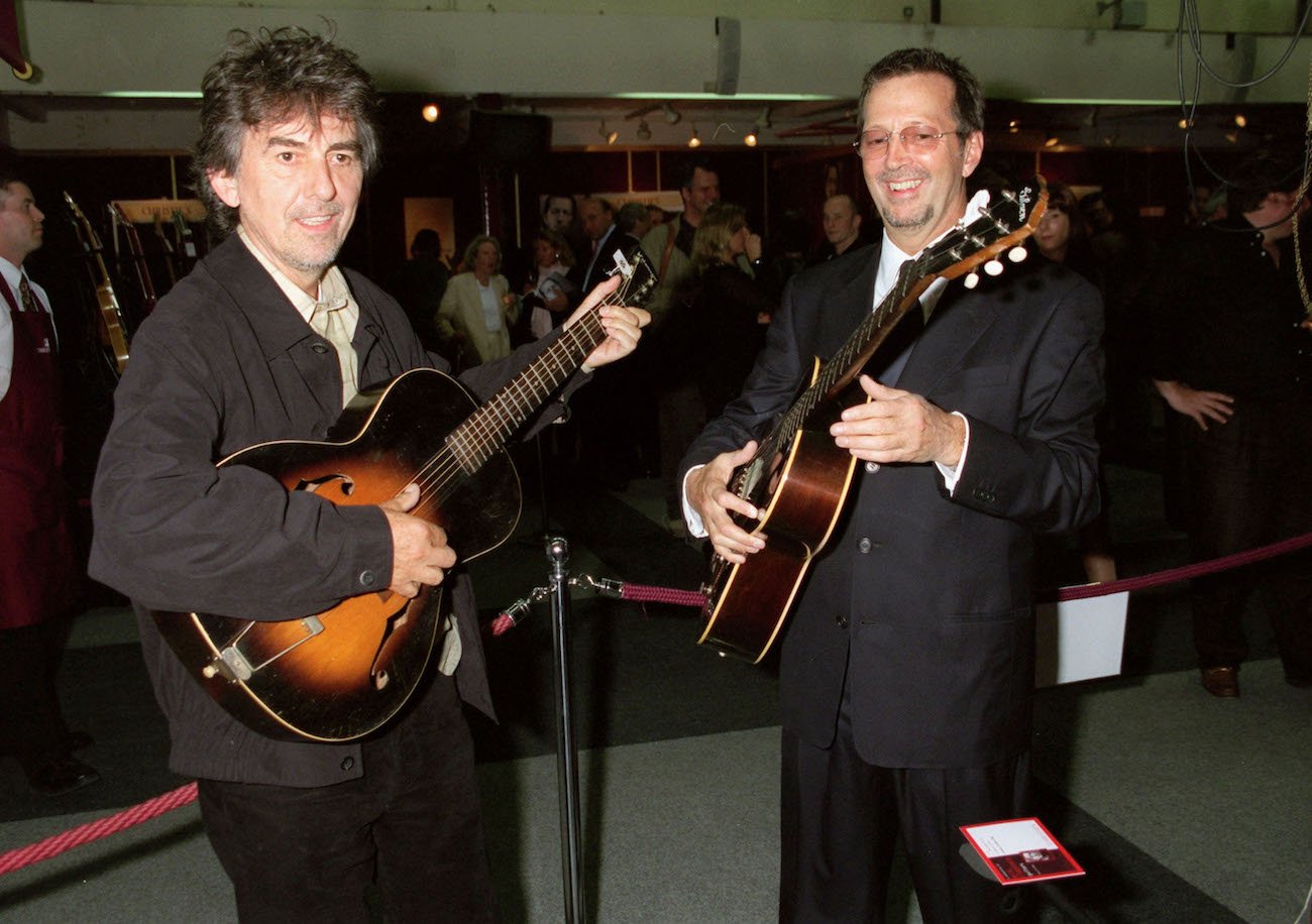 George Harrison and Eric Clapton at Christie's Auction in 1999.