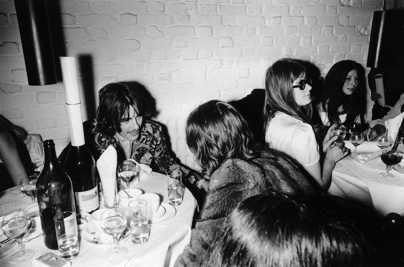 George Harrison and his friends during the opening of The Beatles' shop. 