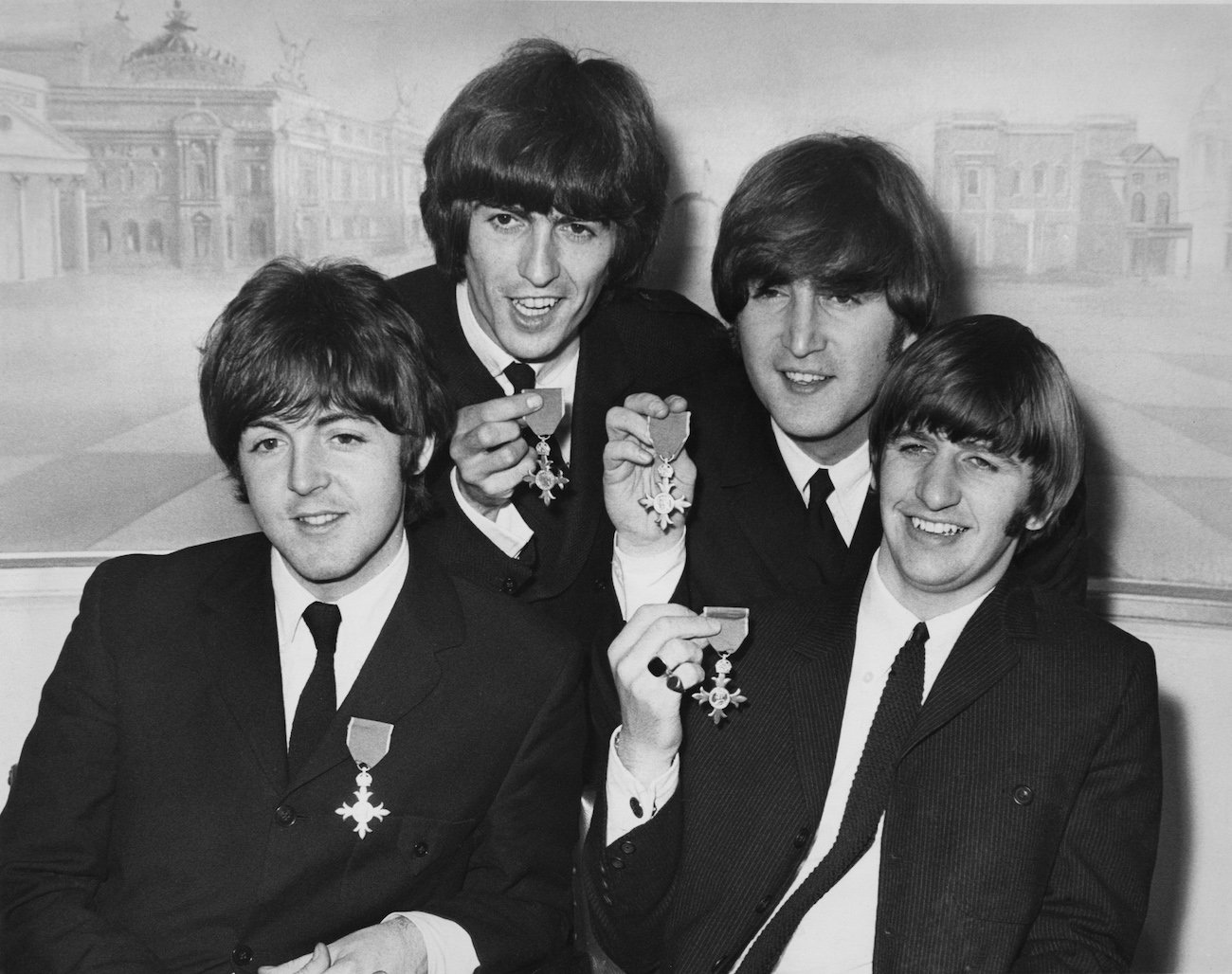 The Beatles after receiving their MBEs in 1965.