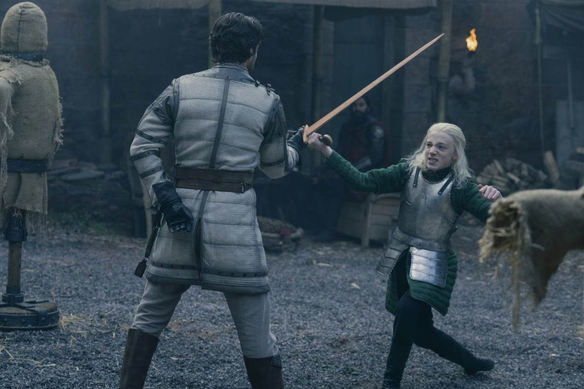 Leo Ashton as Aemond Targaryen in House of the Dragon Episode 6. Aemond spars in a sword fight with Ser Criston Cole.
