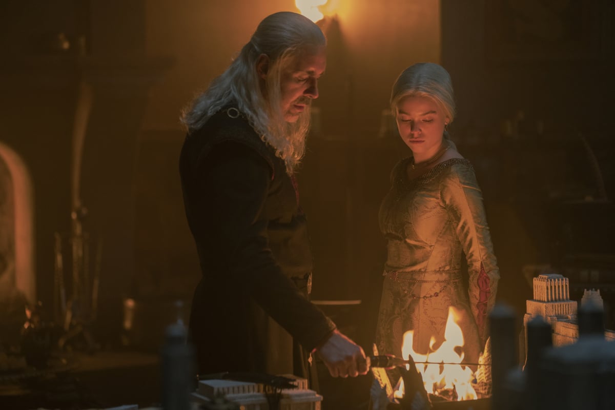 Rhaenyra drank moon tea in House of the Dragon Episode 4. In this photo, Rhaenyra and Viserys look at a dagger in the fire.