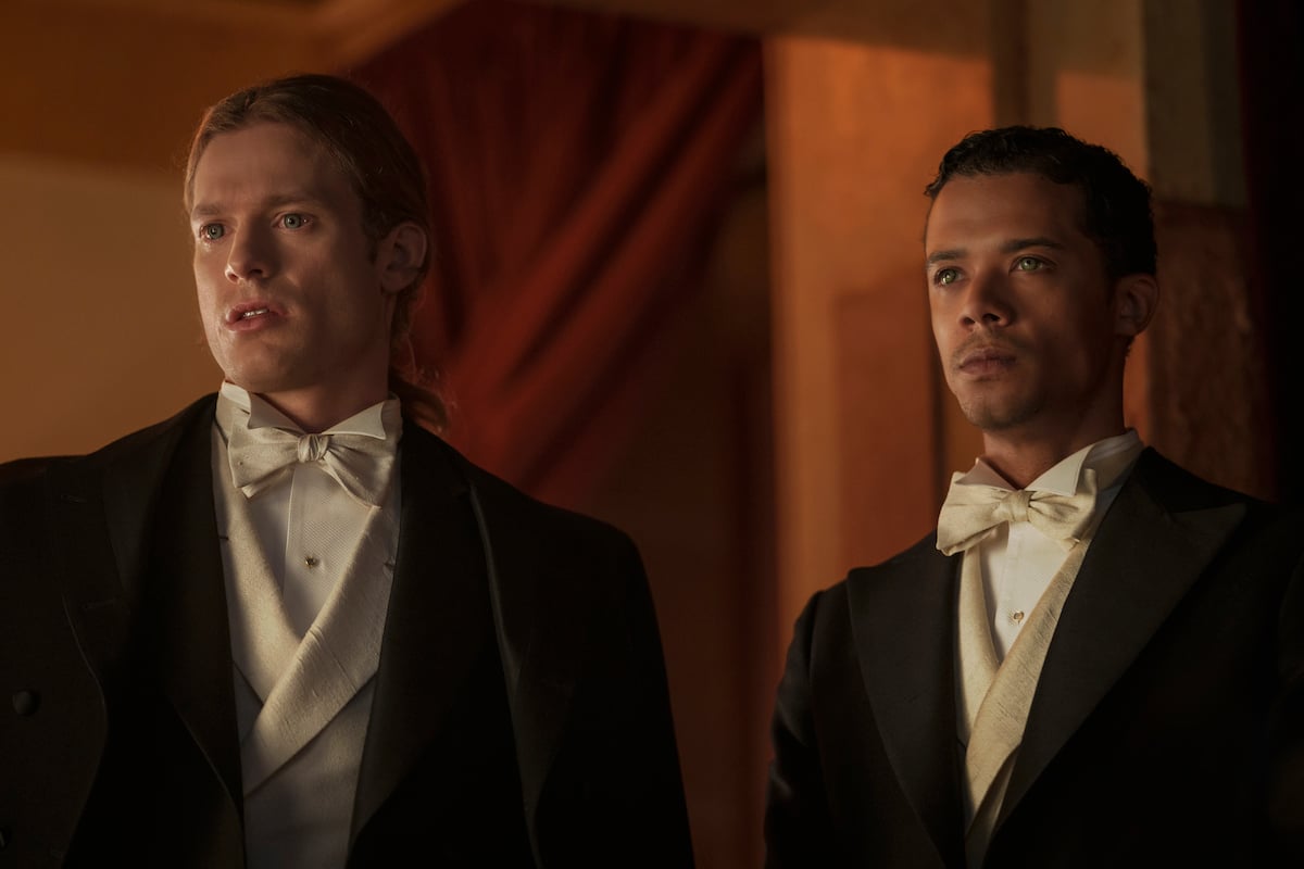 'Interview with the Vampire': Lestat (Sam Reid) and Louis (Jacob Anderson) stand together wearing suits