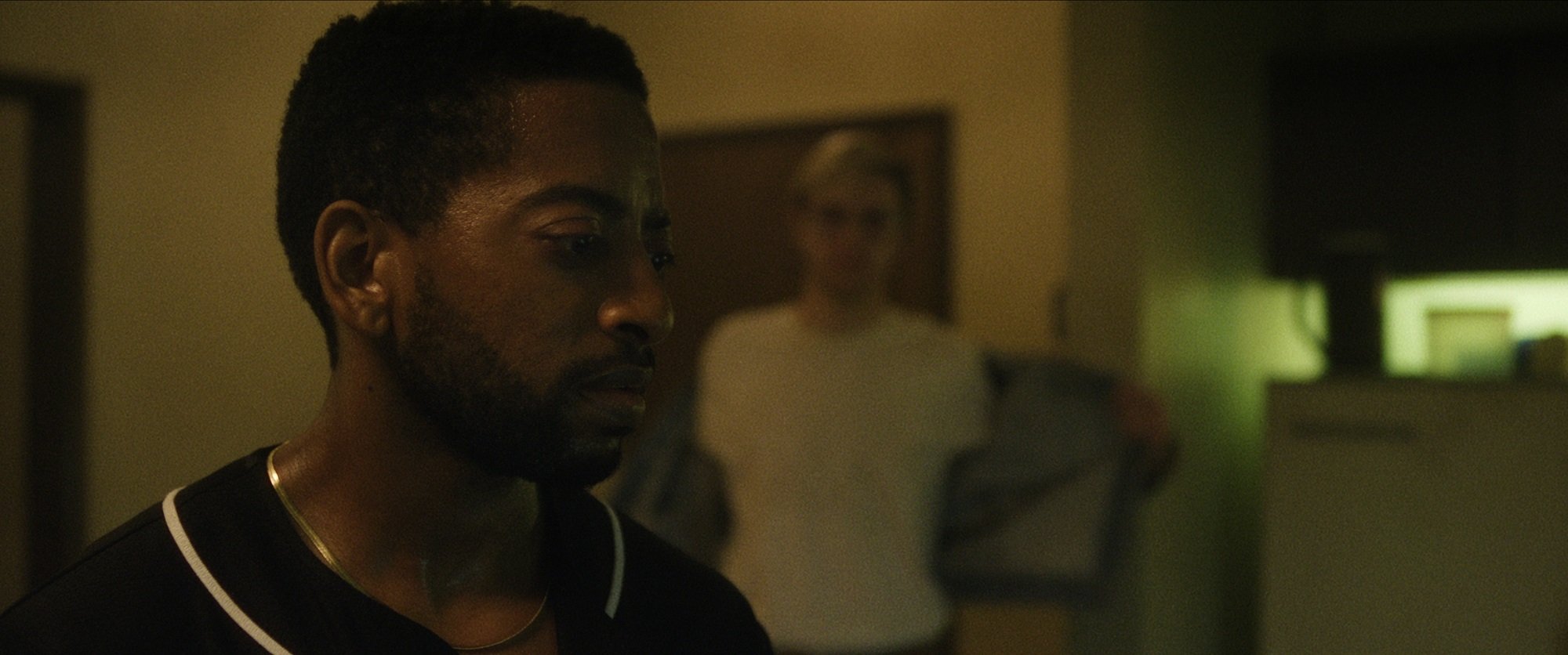 'Dahmer — Monster: The Jeffrey Dahmer Story': Shaun J. Brown as Tracy Edwards, and Evan Peters as Jeffrey Dahmer in his apartment building