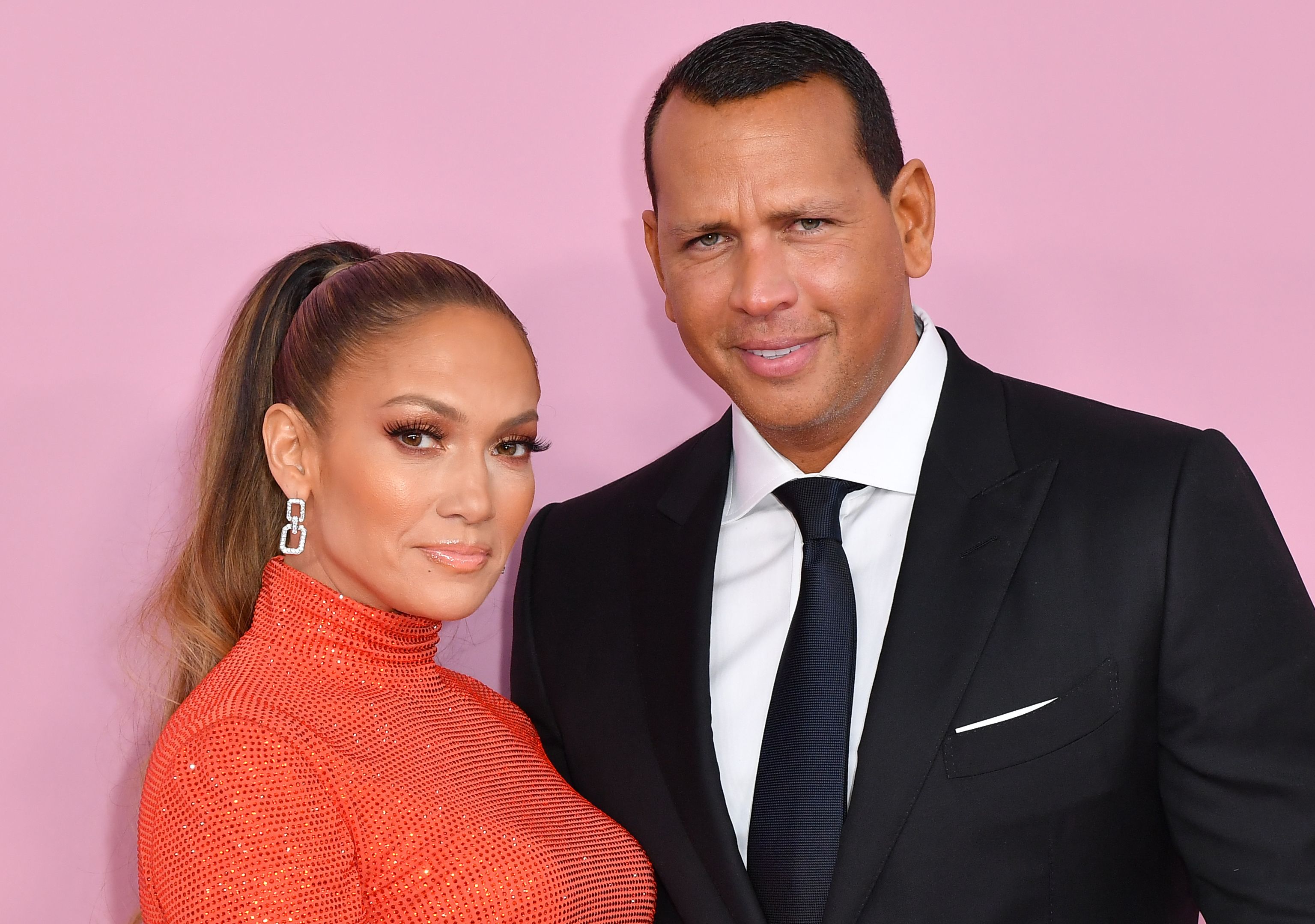 Jennifer Lopez and Alex Rodriguez pose during a media event.