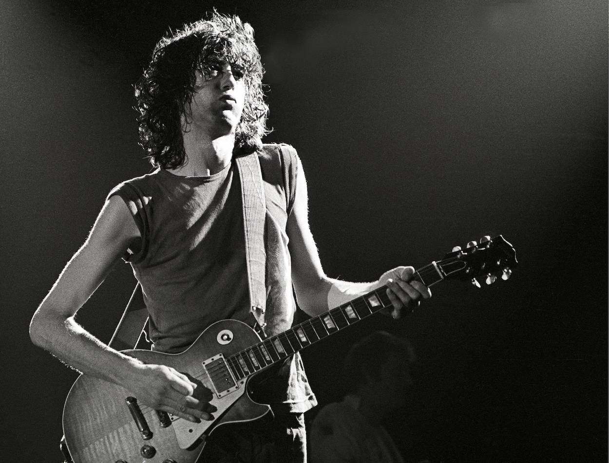 Jimmy Page plays guitar during a Led Zeppelin concert. Page once said his drug use never felt out of control, but Led Zeppelin's later albums seem to tell a different story.