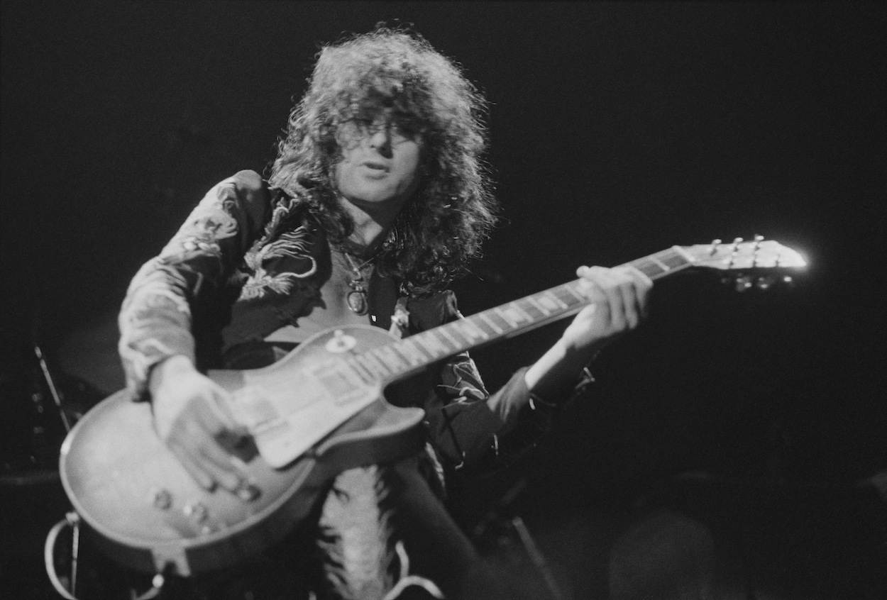 Led Zeppelin guitarist Jimmy Page plays during a 1975 concert in London. Page's guitar-playing style is so unique it's almost impossible to copy, according to guitar wizard Joe Bonamassa.