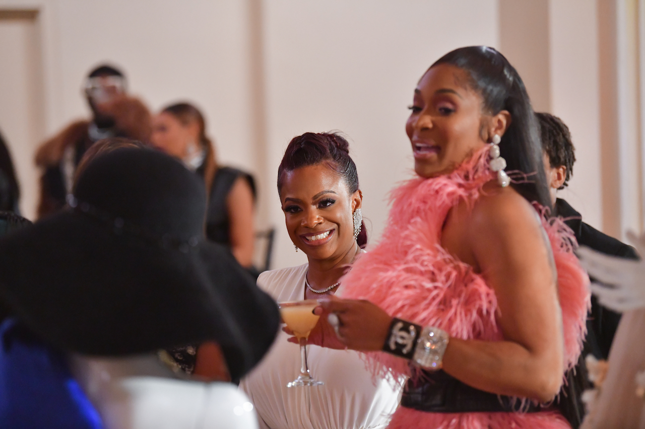 Kandi Burruss and Marlo Hampton at her Le'Archive debut filming 'RHOA;' Hampton's salary for a show Burruss produced was revealed