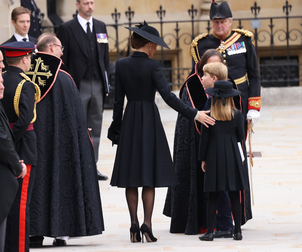 Kate Middleton comforts Princess Charlotte in a photo from Queen Elizabeth's funeral on Sept. 19, 2022