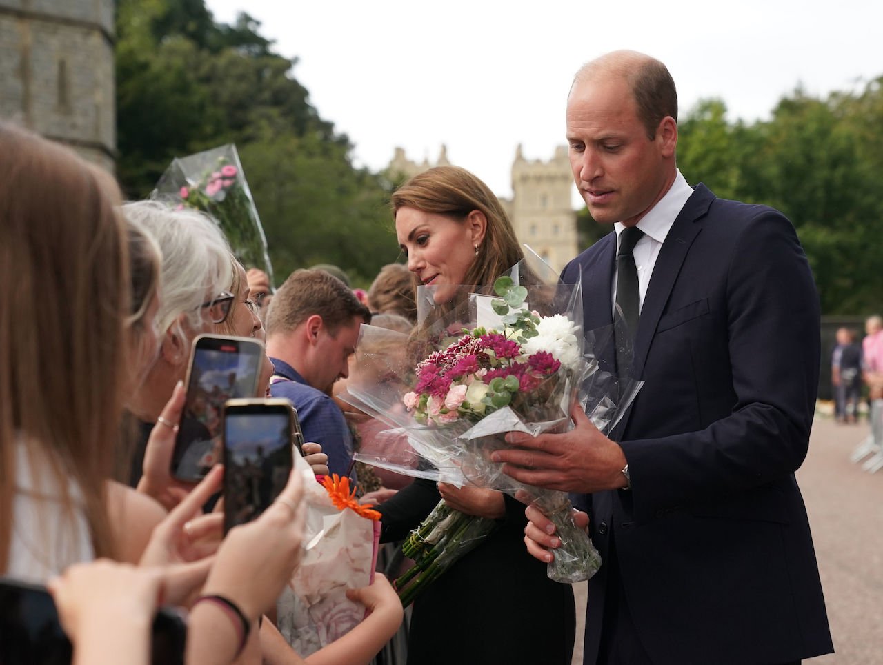 Kate Middleton and Prince William meet members of the public at Windsor Castle on September 10, 2022. Some say Kate has helped illuminate William's compassionate side.