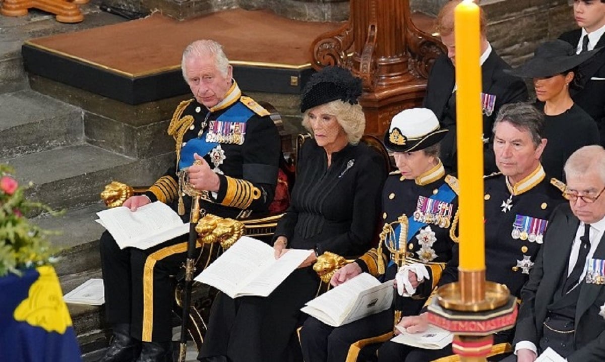 King Charles III seated one row in front of Meghan Markle at Queen Elizabeth II's funeral