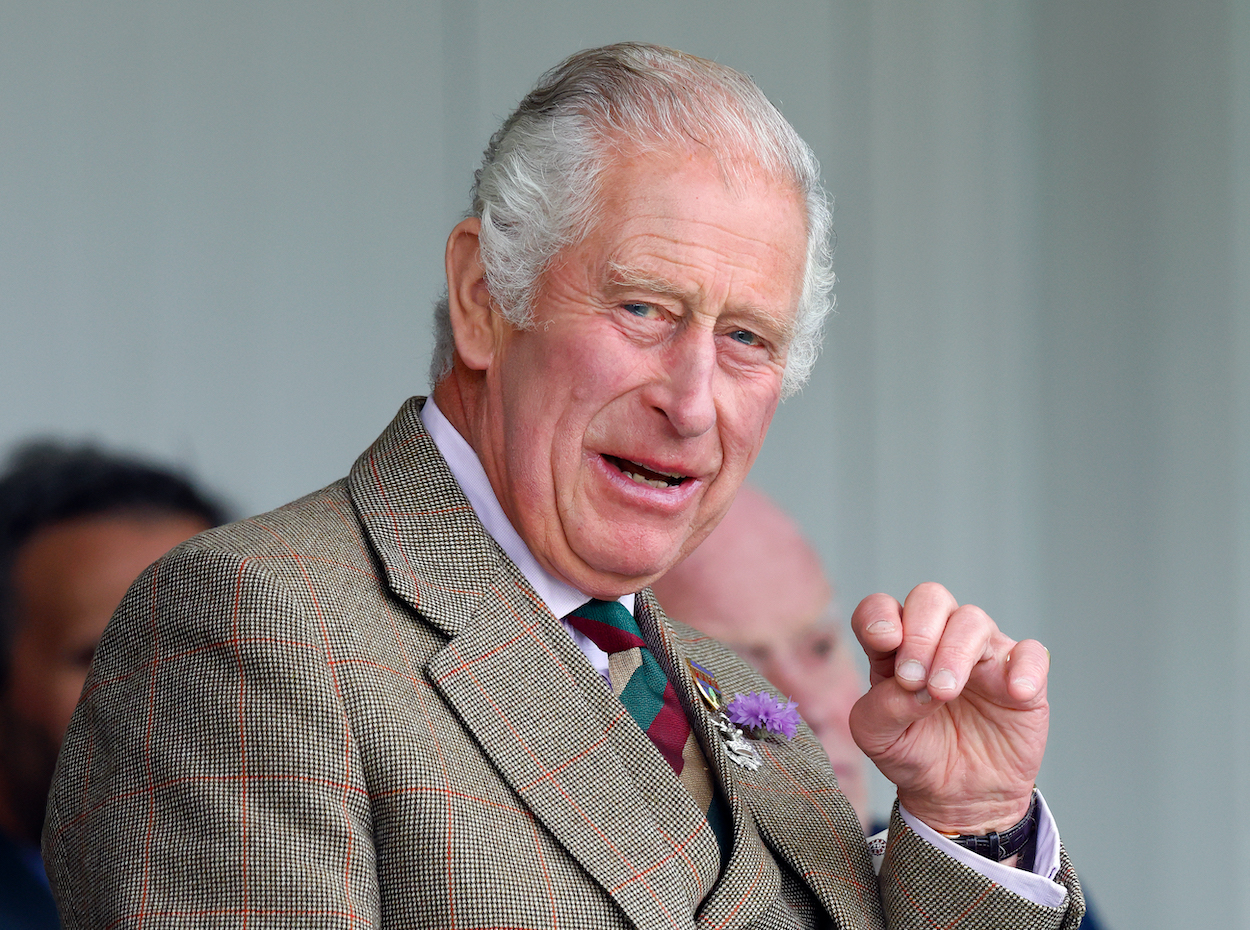 England's King Charles III attends an event in Braemar, Scotland on Sept. 3. 2022. Charles' swollen fingers have raised some concerns among royal watchers, and a doctor weighs in on what they could signal.