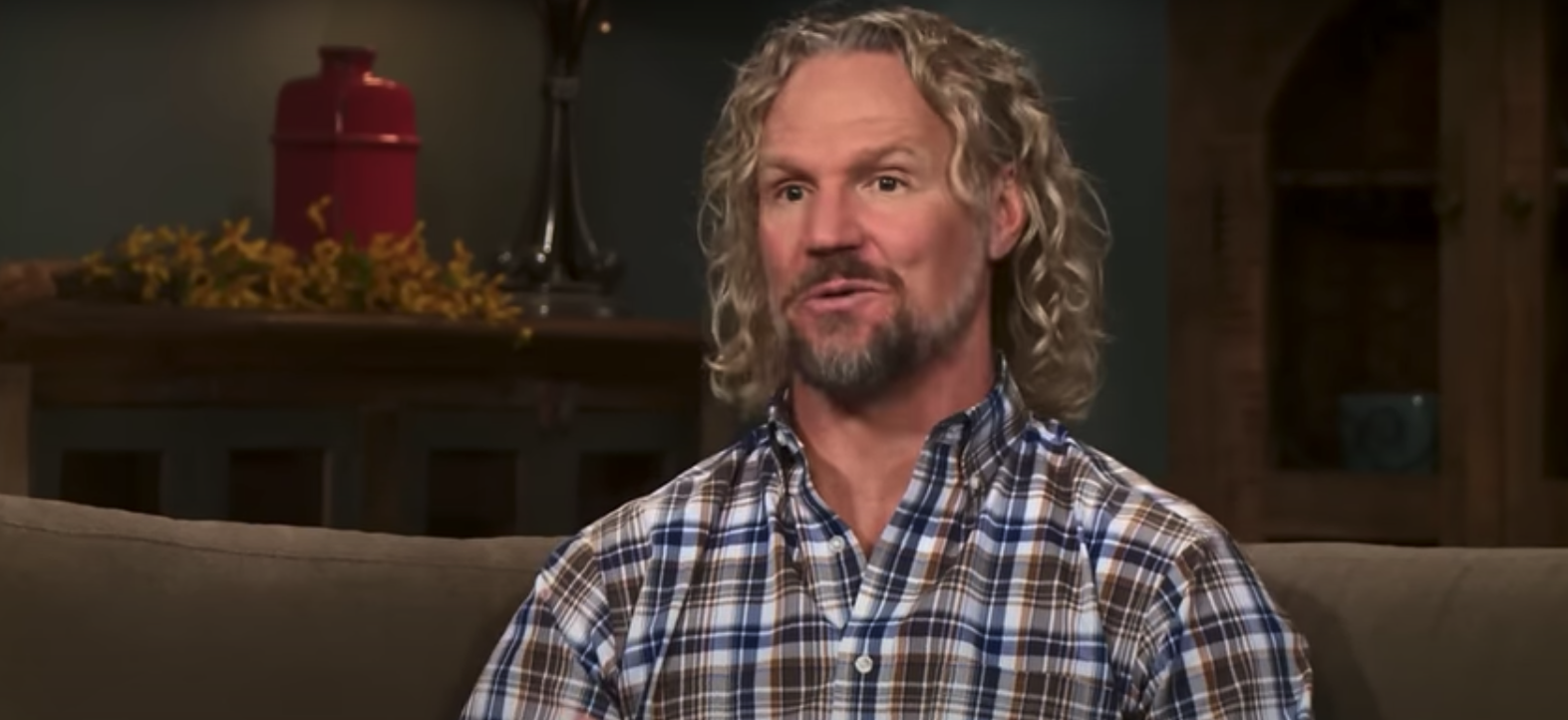 Kody Brown wearing a plaid shirt in an episode of 'Sister Wives'