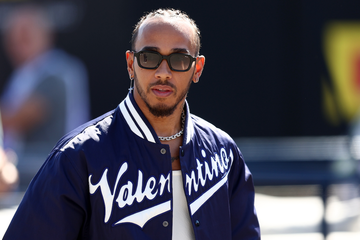 Lewis Hamilton of Mercedes looks on in the paddock before qualifying for the F1 Grand Prix of Italy