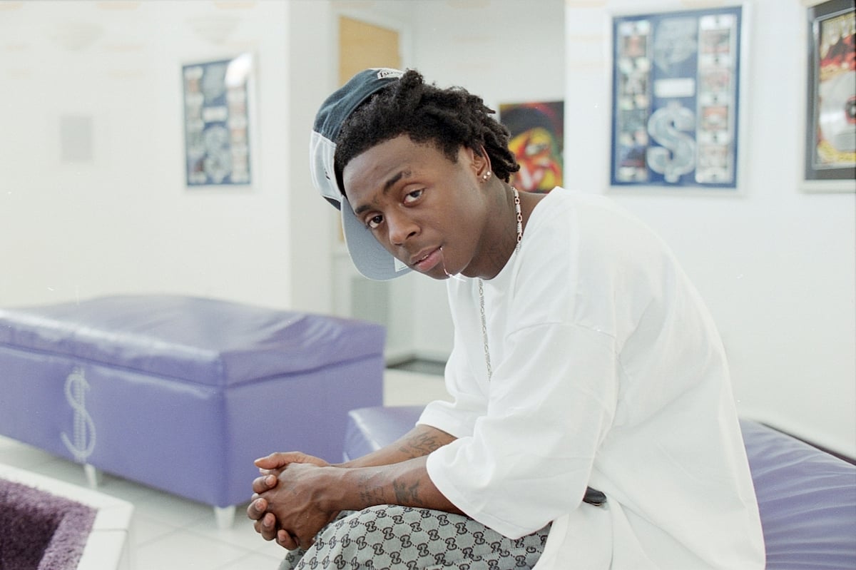 Rapper Lil' Wayne poses in his home in 2003