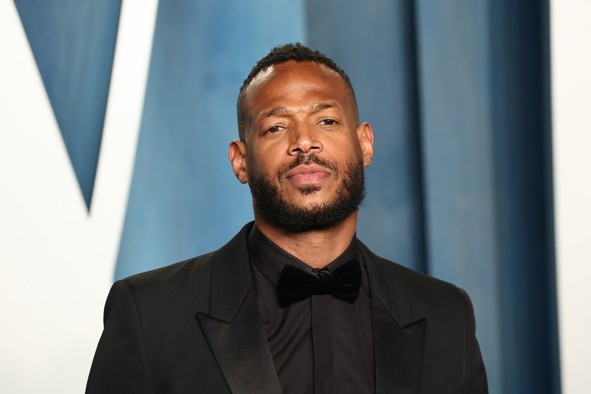 Marlon Wayans posing at the Vanity Fair Oscar Party.