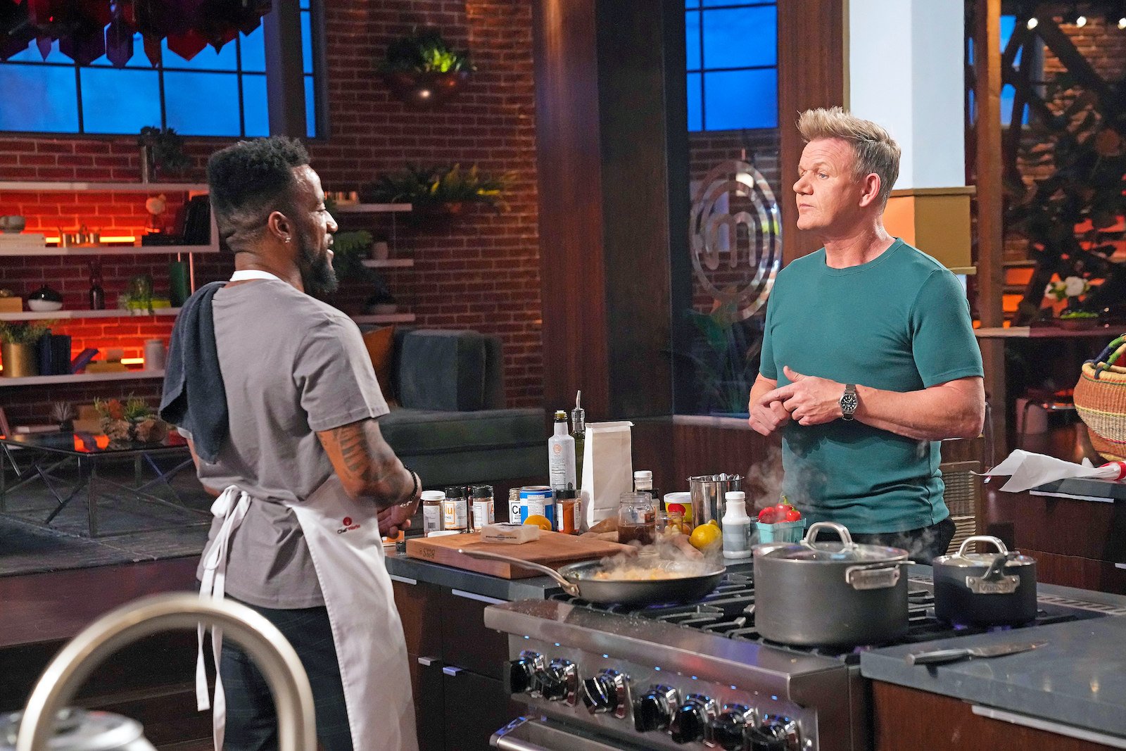 'MasterChef: Back to Win' cook Christian Green stands in front of chef Gordon Ramsay