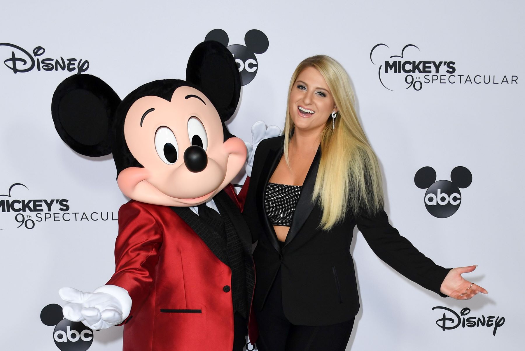 Meghan Trainor and Disney's Mickey Mouse at Mickey's 90th Spectacular at The Shrine Auditorium in Los Angeles