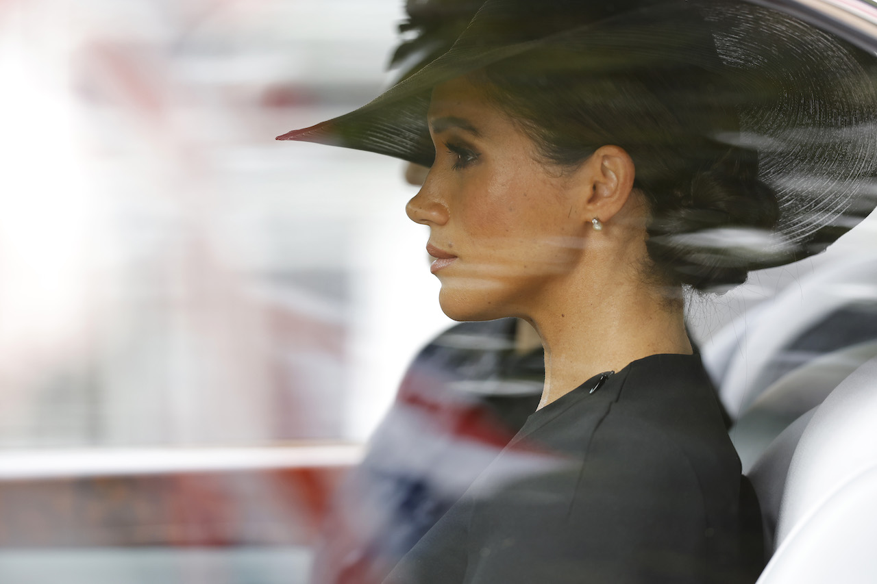 Meghan Markle, Duchess of Sussex, is driven down The Mall after the funeral for HM Queen Elizabeth II's funeral in London, United Kingdom.