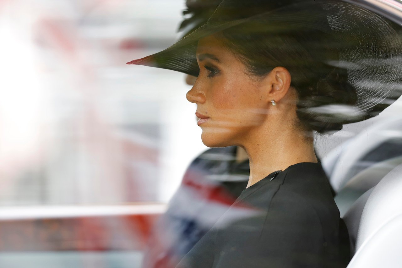 Meghan Markle, Duchess of Sussex, is driven down The Mall after the funeral for HM Queen Elizabeth II's funeral in London, United Kingdom.