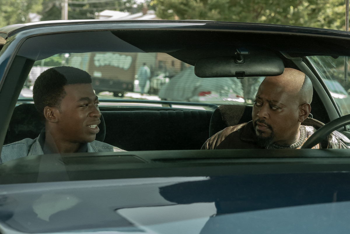 Mekai Curtis as Kanan Stark and Omar Epps as Detective Malcolm Howard sitting in a car conversing in 'Power Book III: Raising Kanan'