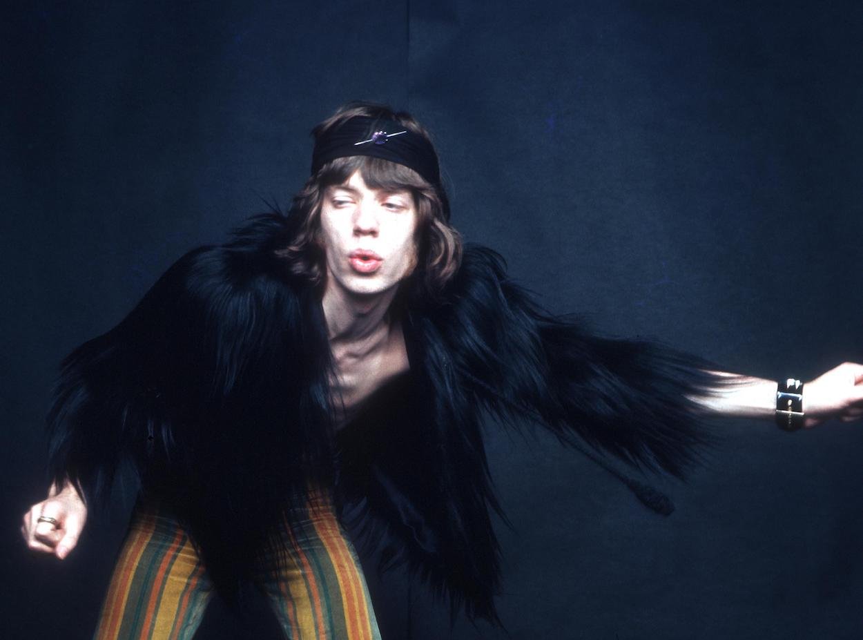 Rolling Stones singer Mick Jagger during a 1969 photoshoot. Brian Jones once criticized Mick Jagger for his "feminine moment," but to Jagger, it was all part of the show.