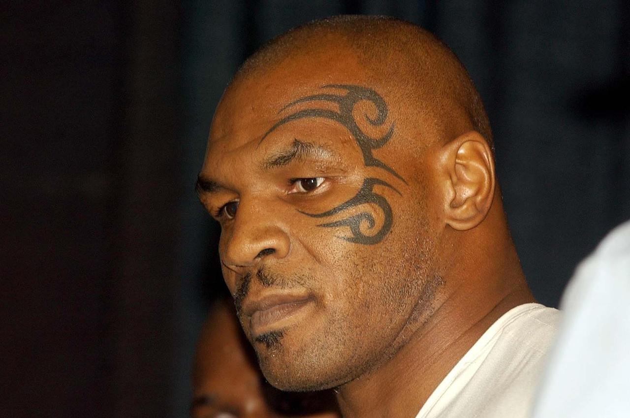 Mike Tyson caught in candid photo; Tyson allegedly sexually assaulted rapper Eve