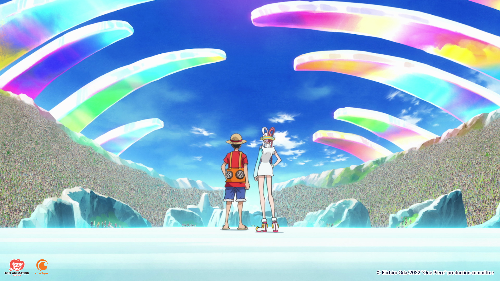 A still from 'One Piece Film Red' for our article about its U.S. release. It shows Monkey D. Luffy and Uta with their backs turned, staring up at colorful ice.