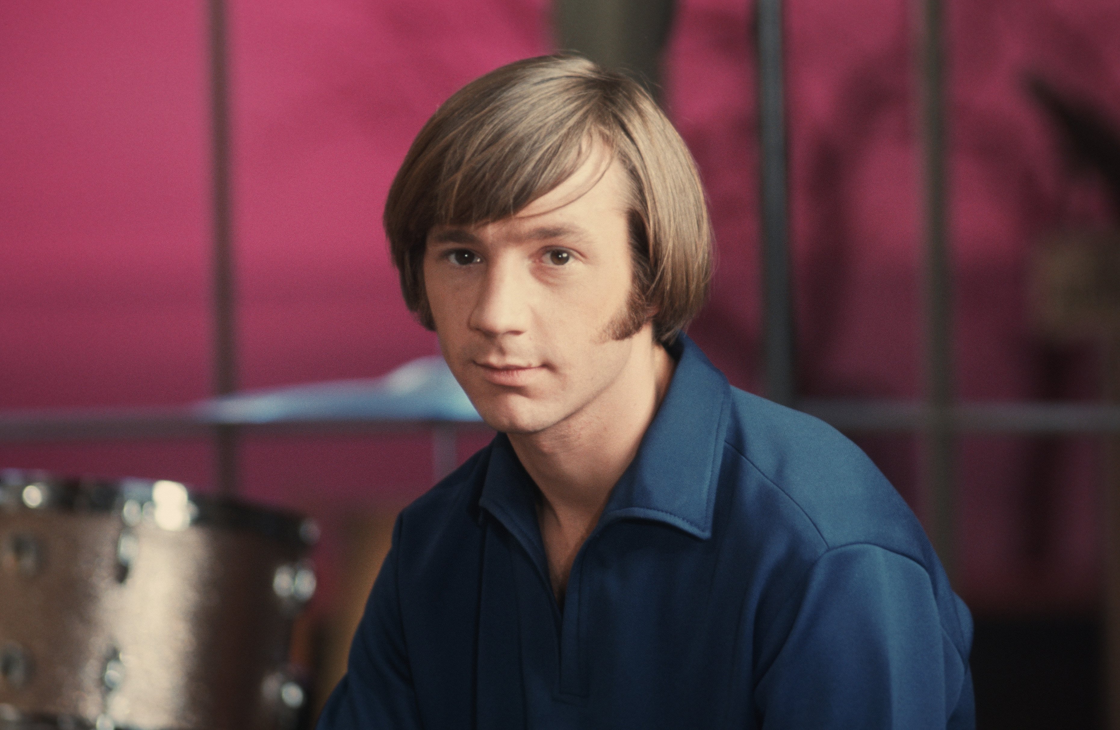 The Monkees' Peter Tork wearing a blue shirt