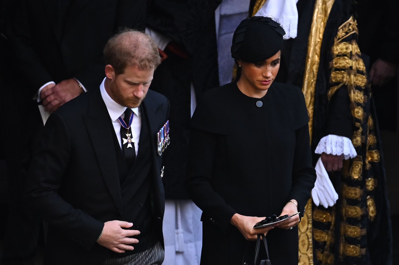 Prince Harry and Meghan Markle attend Queen Elizabeth II's funeral.
